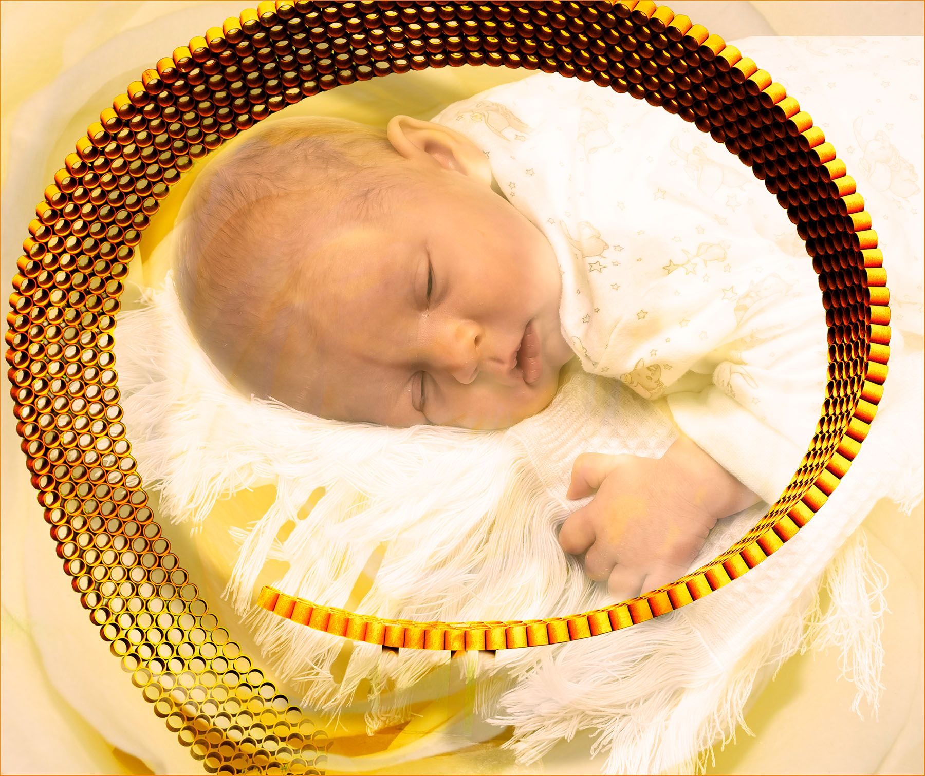 A composite of an baby inside a rose and surrounded by a ring