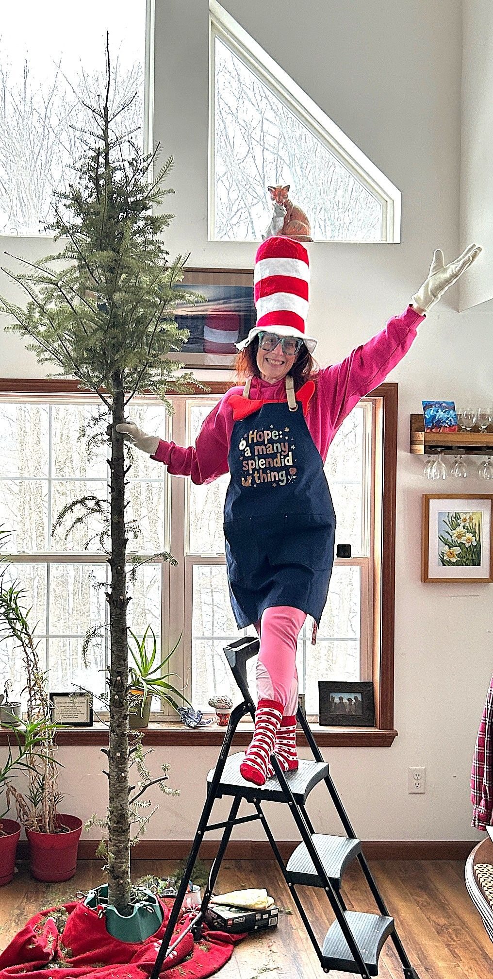 Hope dressed as The Cat in the Hat standing next to a 