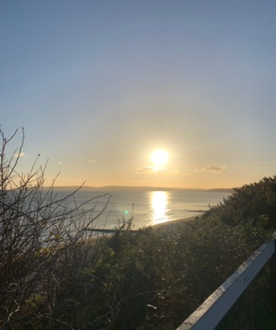 Photo of sunset over sea