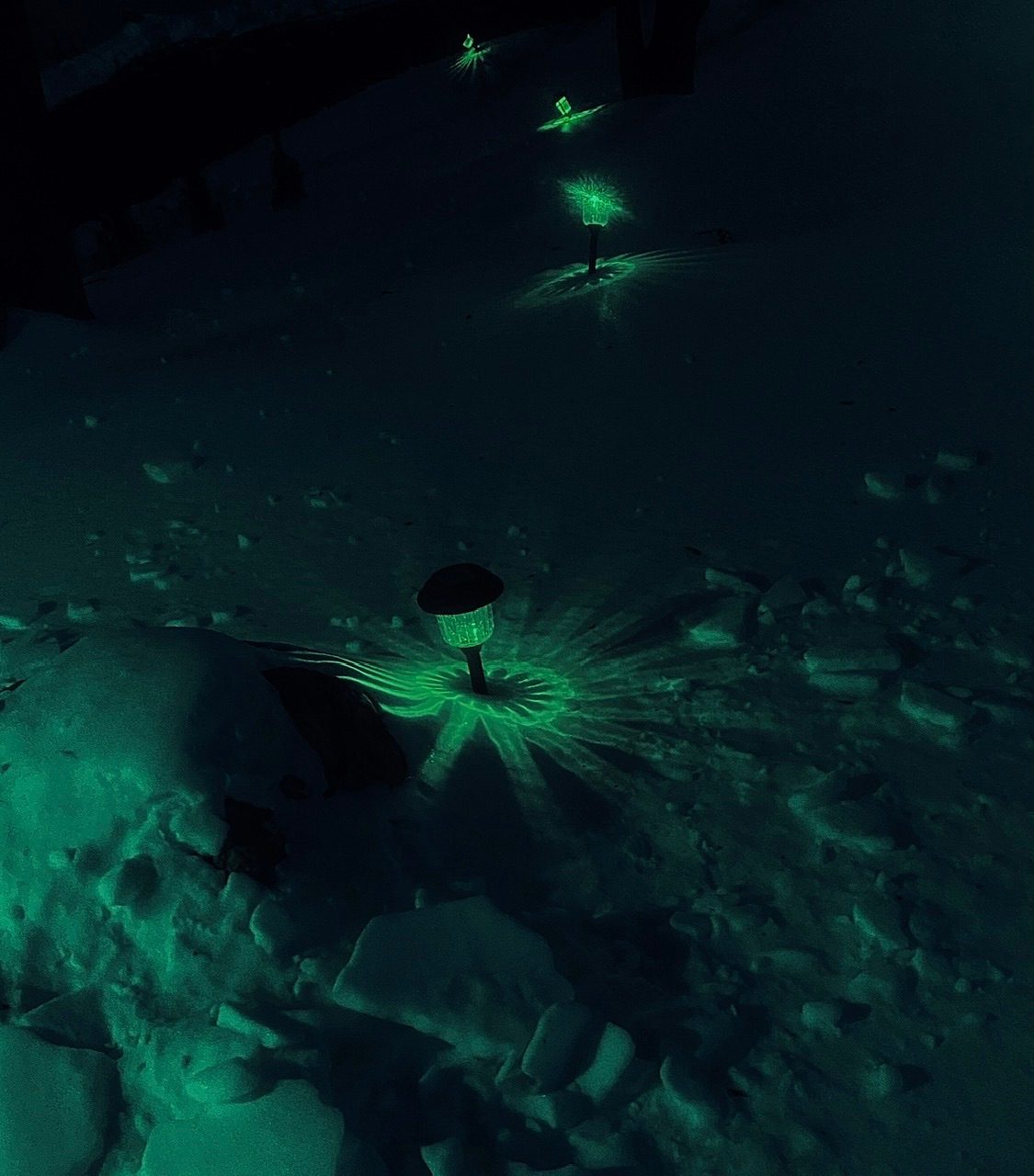 Night Photograph of ground lights. Photo Tinted green.