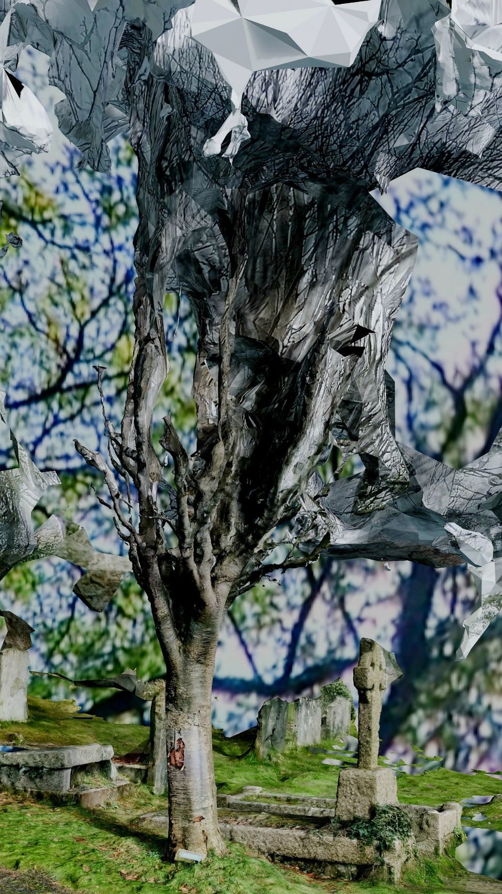 A leafless tree in a Cemetery branches into paper.