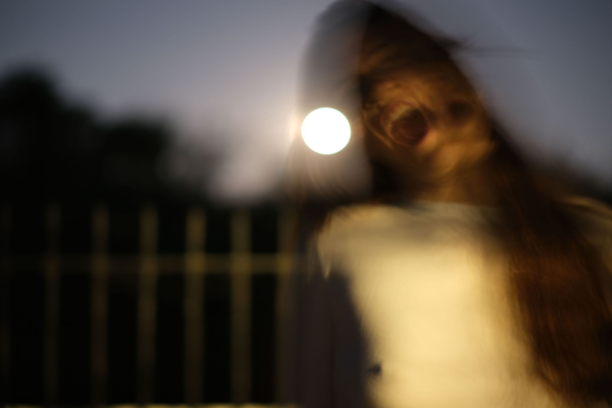 portrait photography, with a brigh moon in the center.