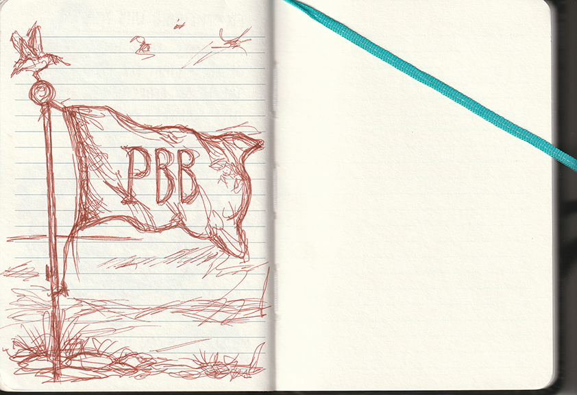 Brown ink drawing on lined notebook paper showing a hand drawn flag hanging from a tall pole. The flag droops and ripples, with rough, sketchy outlines and dense scribbled shading. In the centre of the flag, the letters ‘PBB’ are written in blocky hand lettering. The base of the pole is surrounded by messy grass and ground marks. Small loose scribbles float in the sky area above. The drawing appears on the left page of an open sketchbook, while the right page is blank except for a turquoise ribbon bookmark crossing diagonally. The overall feel is quiet, informal, and provisional.