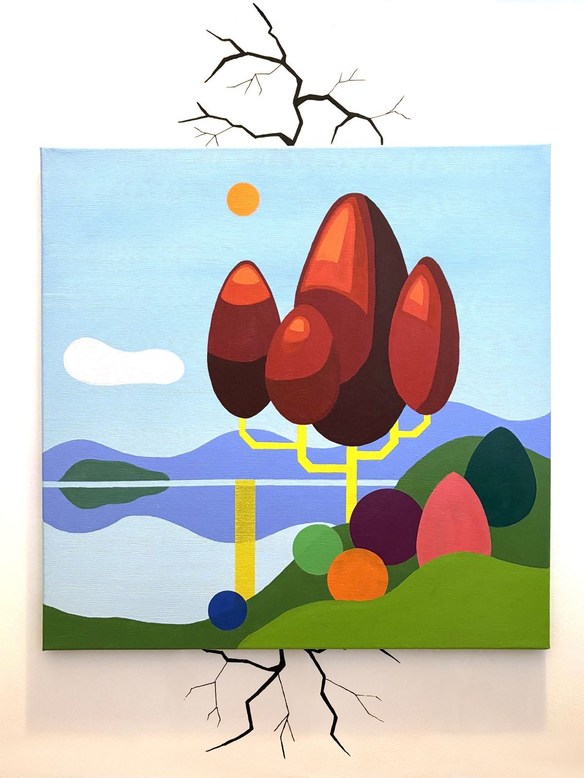 A piece of landscape modern art hung on the wall to try to fix a crack in the plaster.