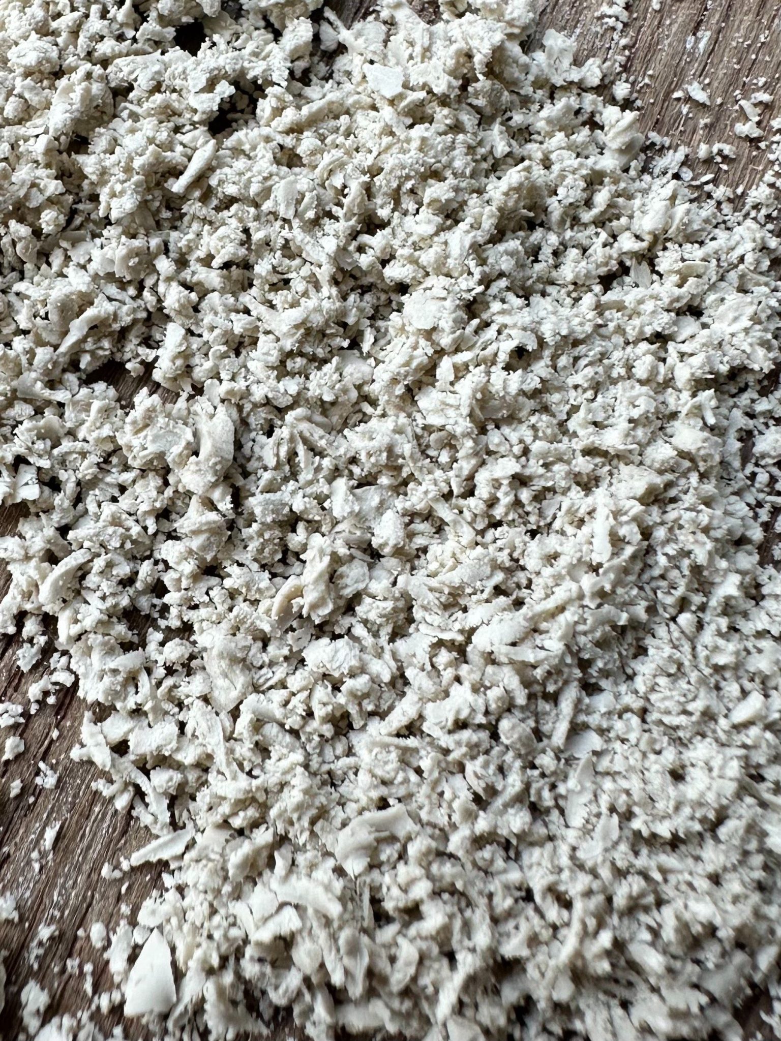 White porcelain grated on board