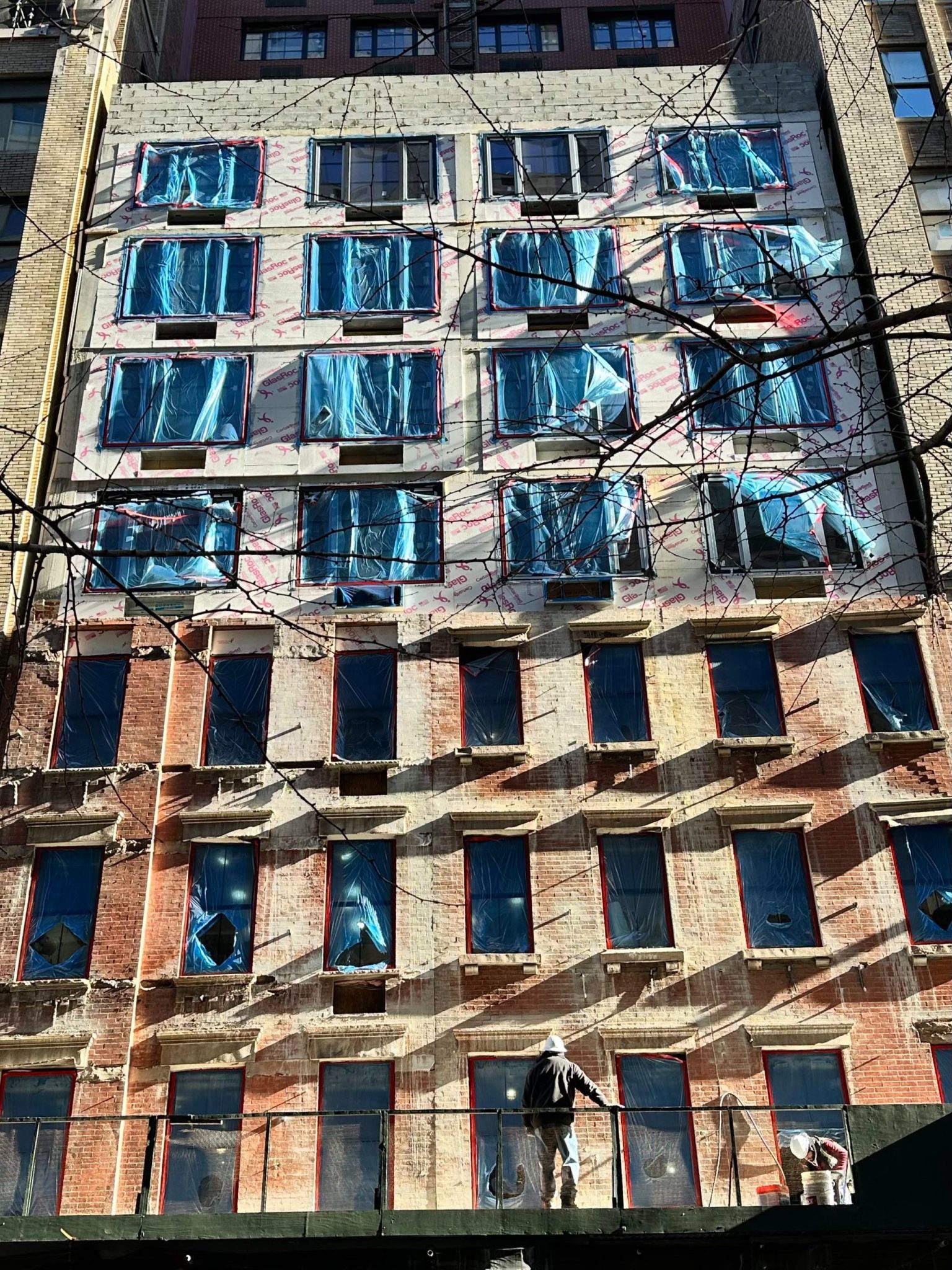 Photograph of building under renovations in NYC