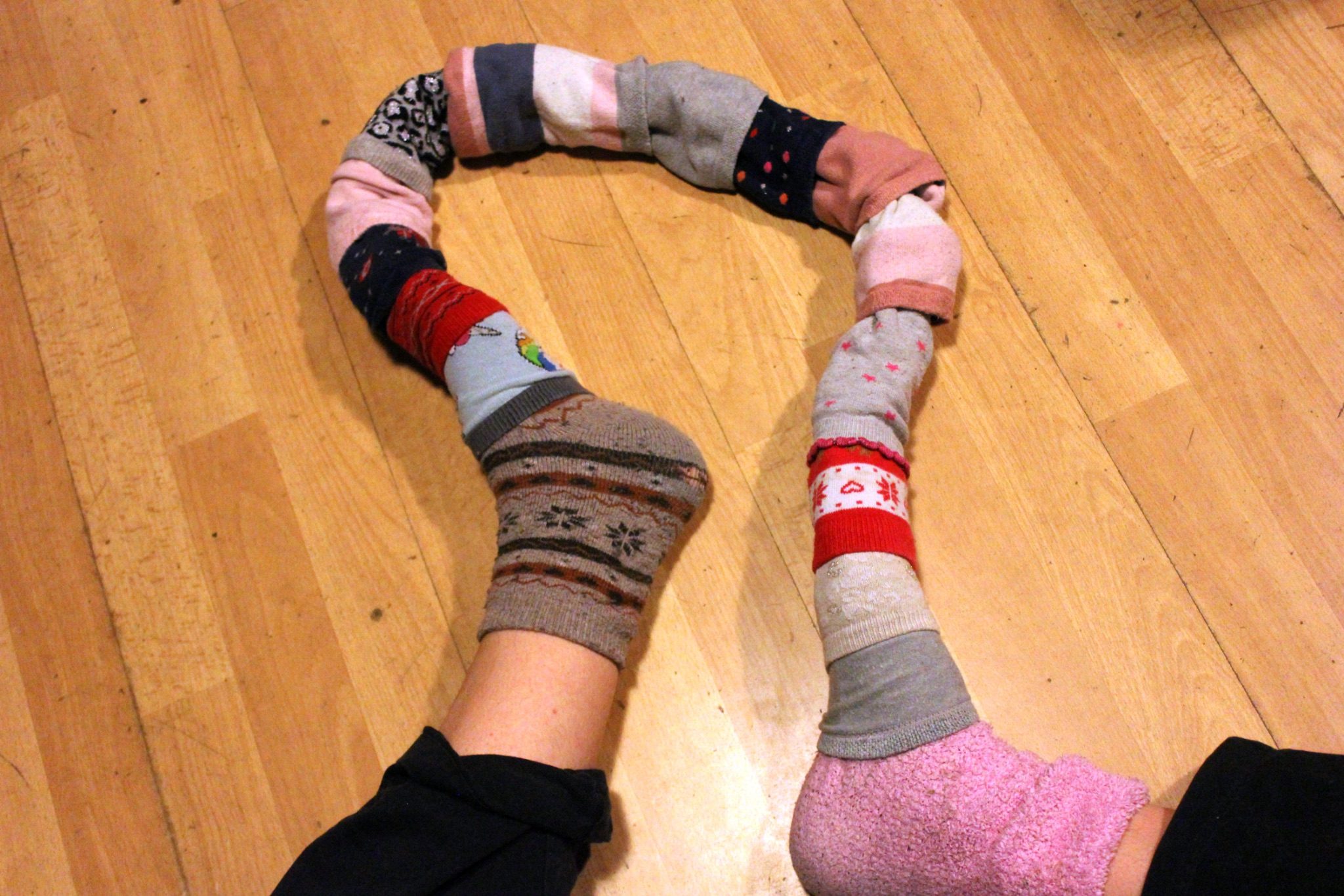 Cleaned out my sock drawer of odd socks and put them all on to form a tube that connects my feet together.