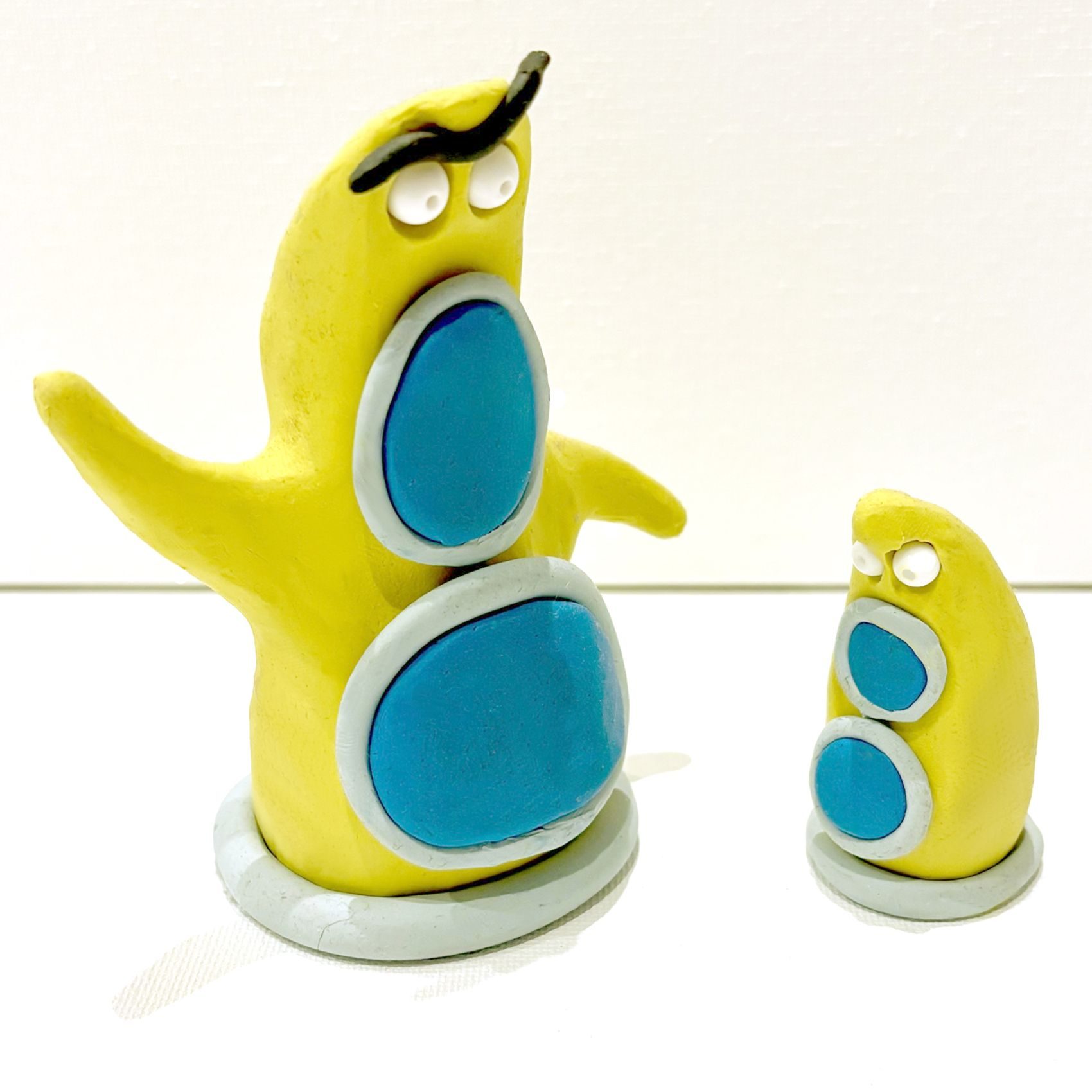 Plasticine sculpts of alien creatures.