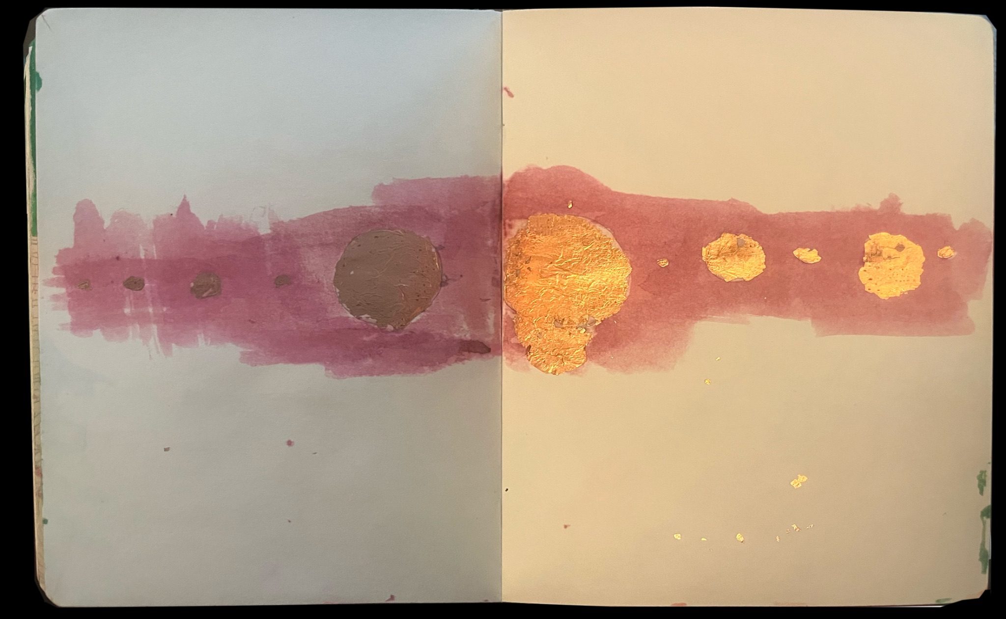 Copper foil on book pages with walnut ink