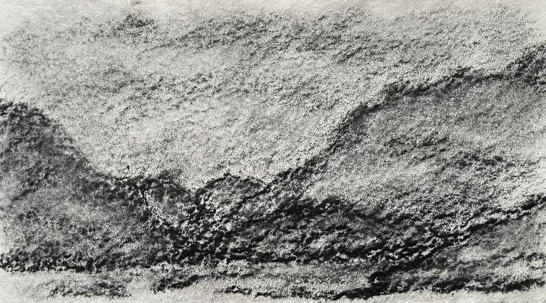 Charcoal landscape drawing of mountains heading to the sea