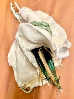 porcelain wrap containing glass seeds