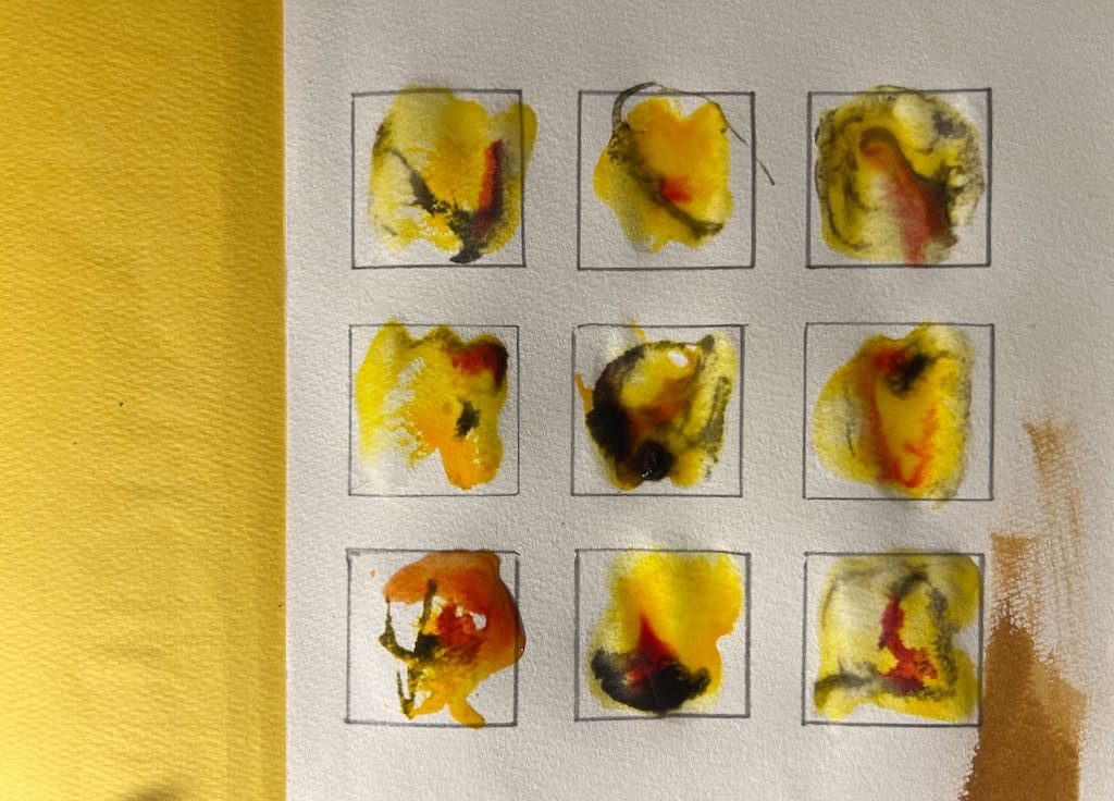 Coloured inks with yellow in 9 squares with a deep yellow border on the left