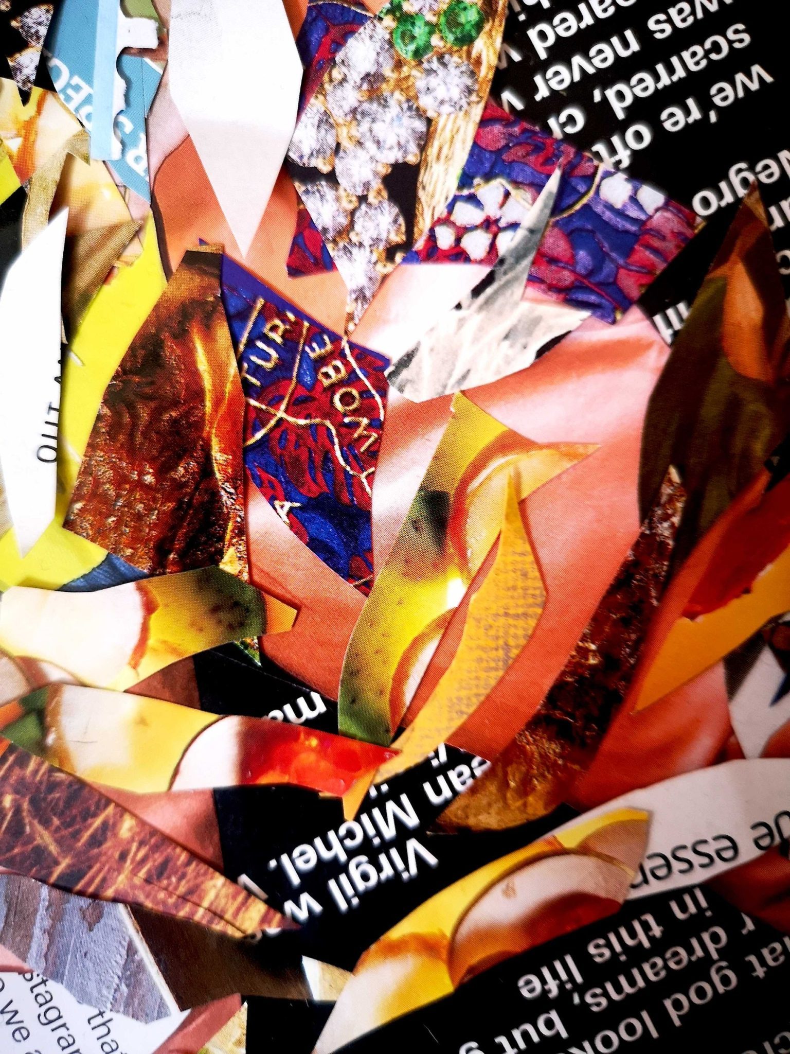 a collage of fragmented pieces of paper, some with text