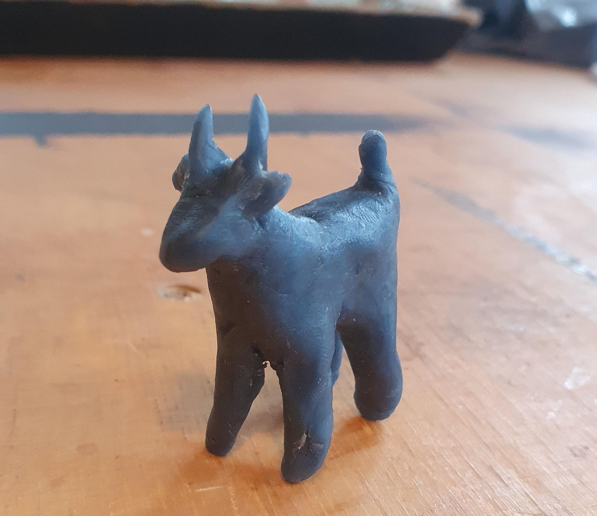 I made this little blue goat of wax inspired by Rumanian music in which women sing and goat (or cow) bells play an important part in it...