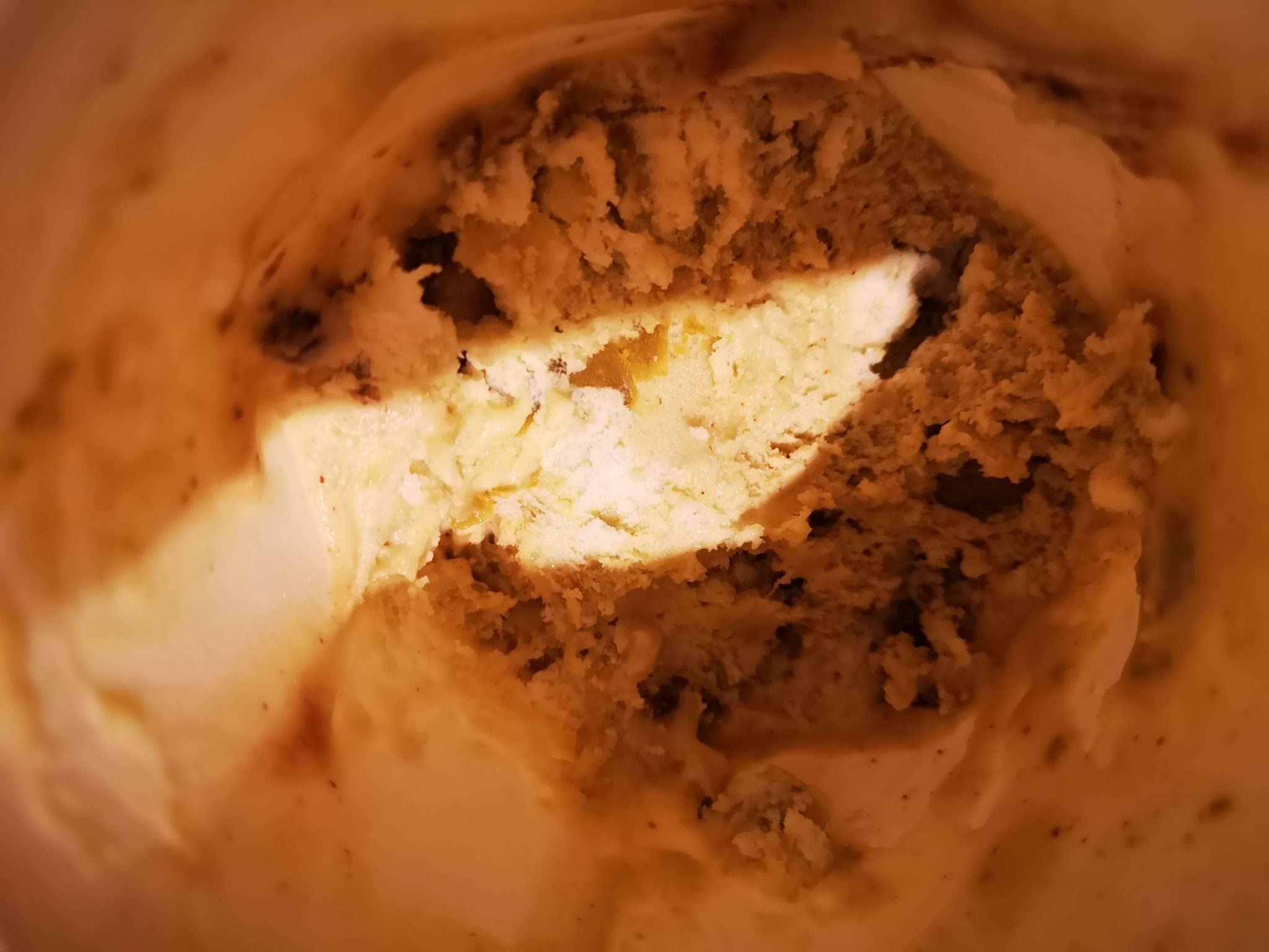 a photograph showing a stream of light onto ice cream