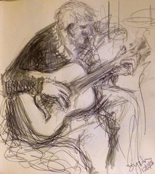 pencil and pen quick drawing of a bearded man playing guitar
