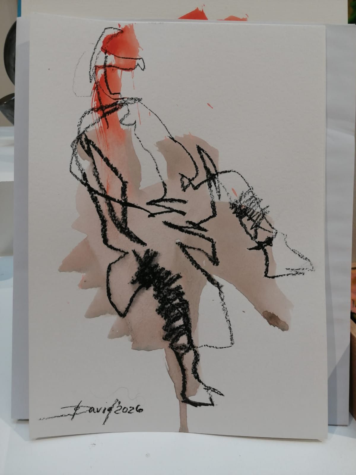 Eine sitzende Person blind gezeichnet