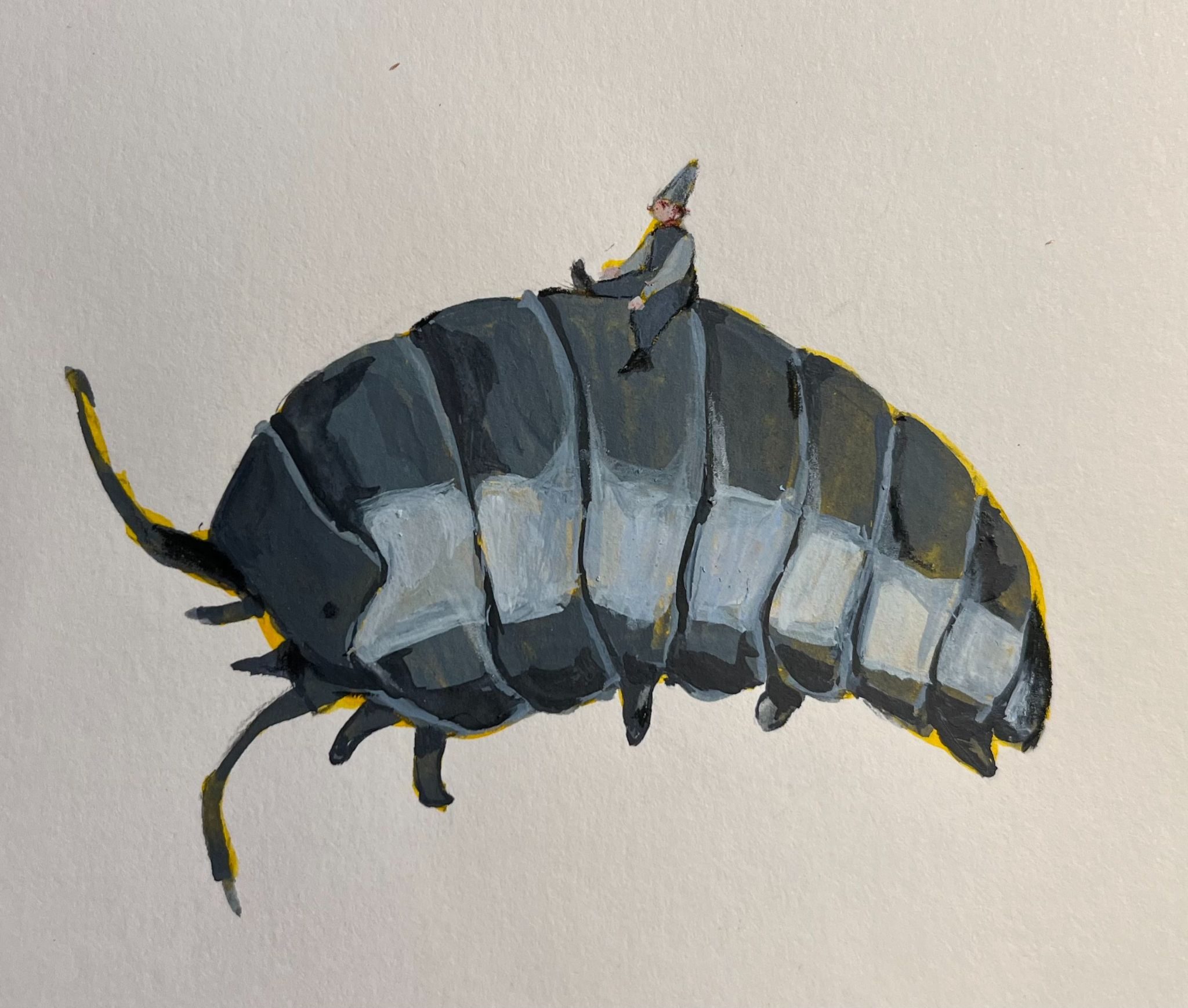 Little character riding a Roly-poly.