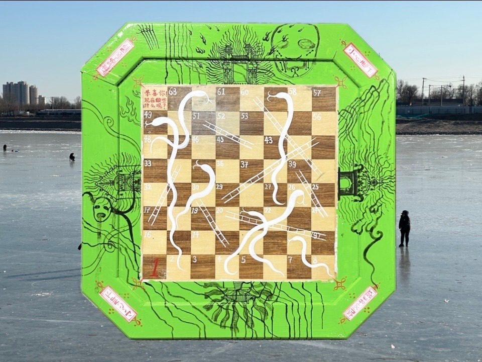 Turning the broken chessboard found on the street into alternative Snakes and Ladders.