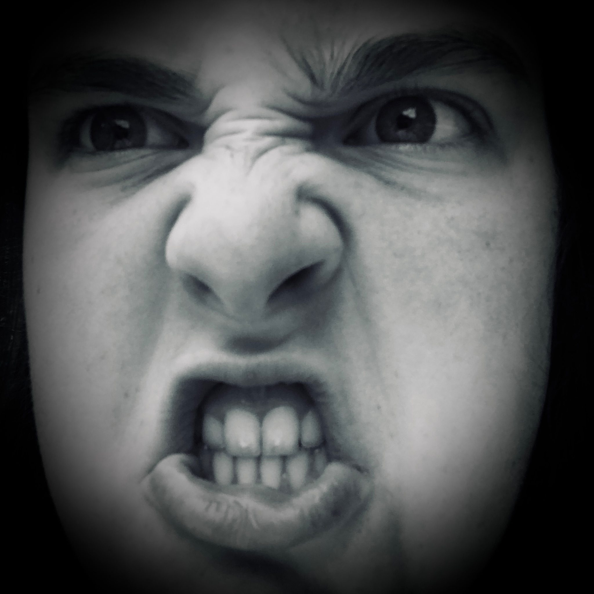 A black & white photo of an angry daughter