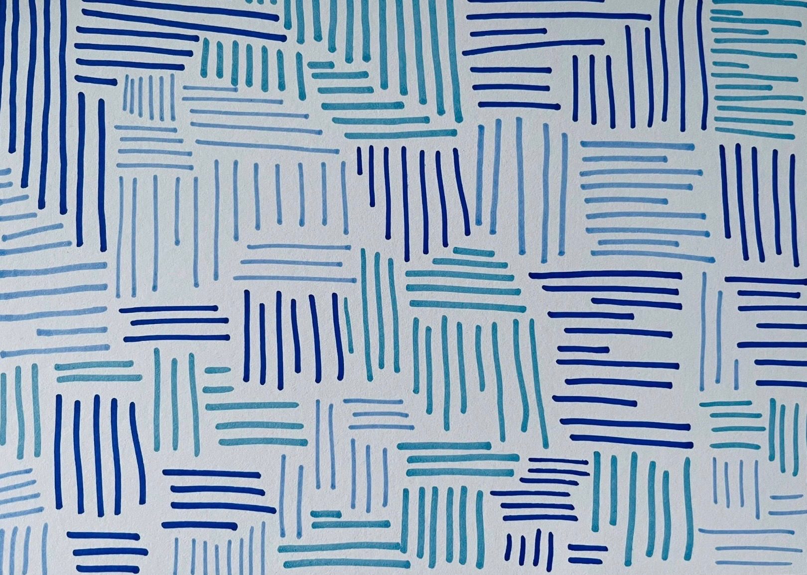 Three shades of blue lines across a landscape white page