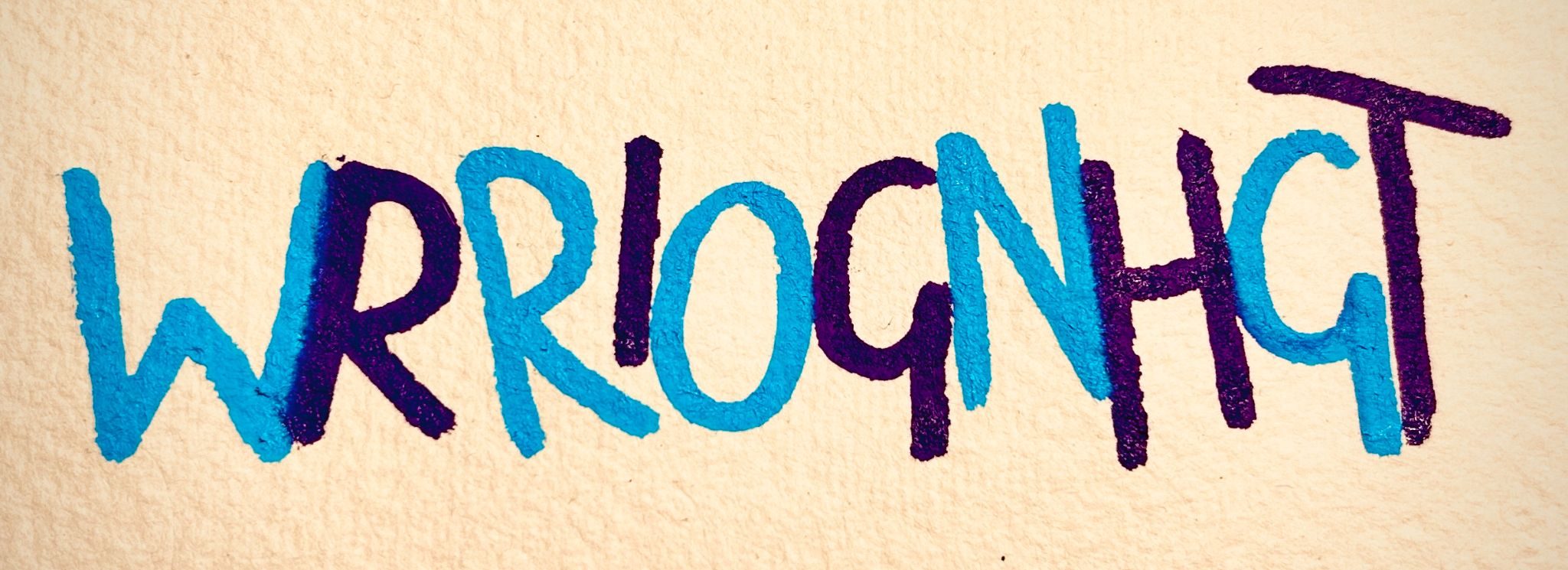 Alternating letters of the words write and wrong in blue and purple