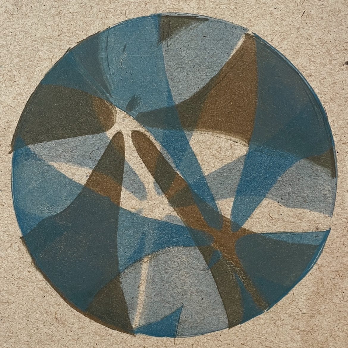 A circular shaped print with leaf sent il shapes layered over each other in brown and dark blue colours.