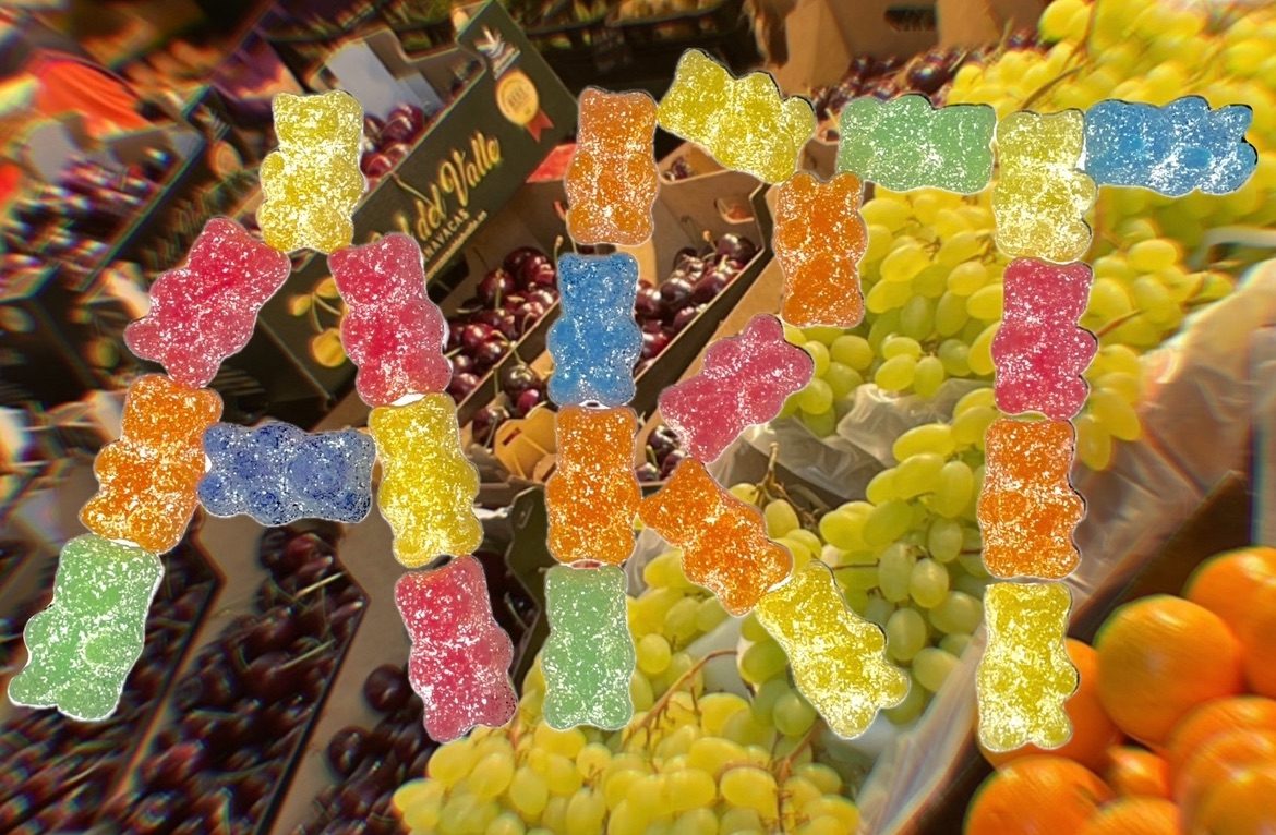 Photo collage: veg and fruit market, the word “ art “ spelled put of multicolored gummy bears at the front