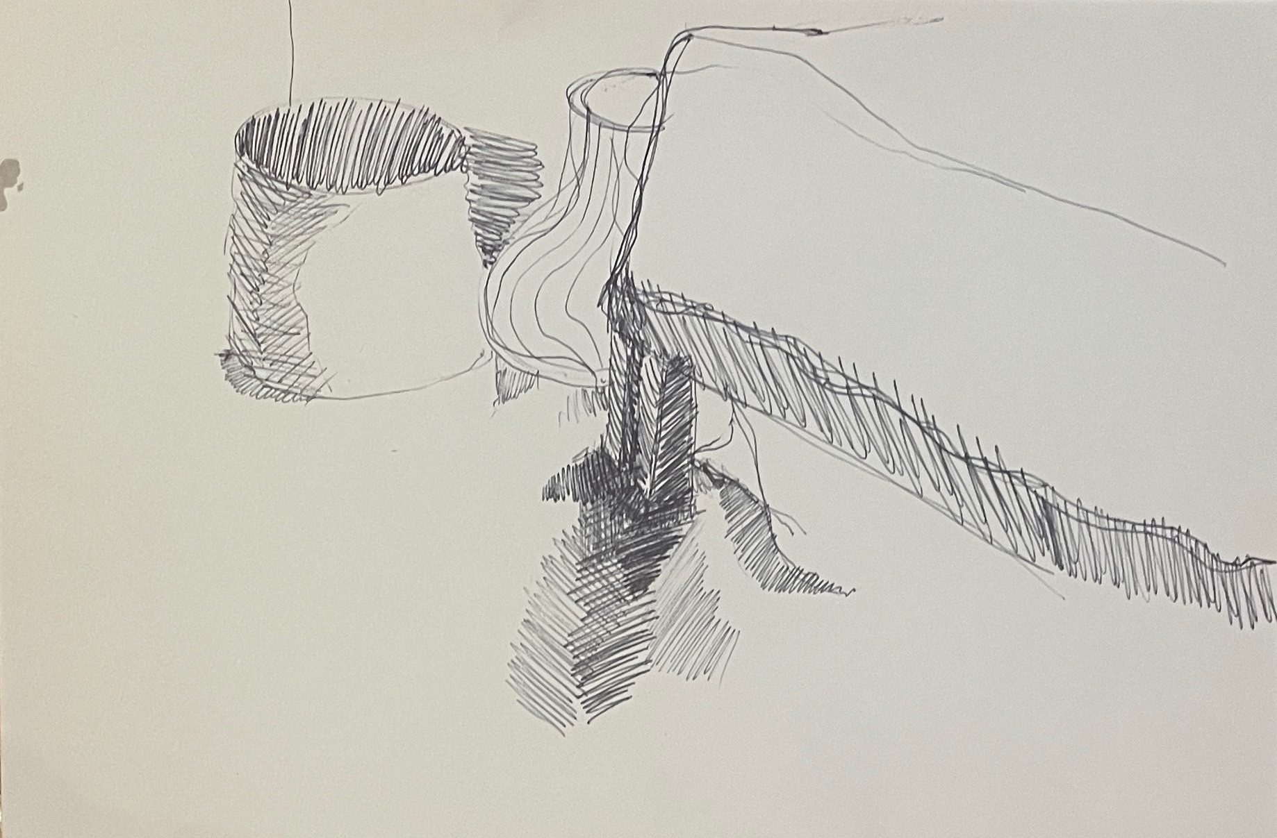 The corner of a sofa, a lamp