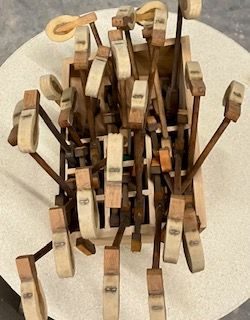 wooden piano hammers collected in a wooden box