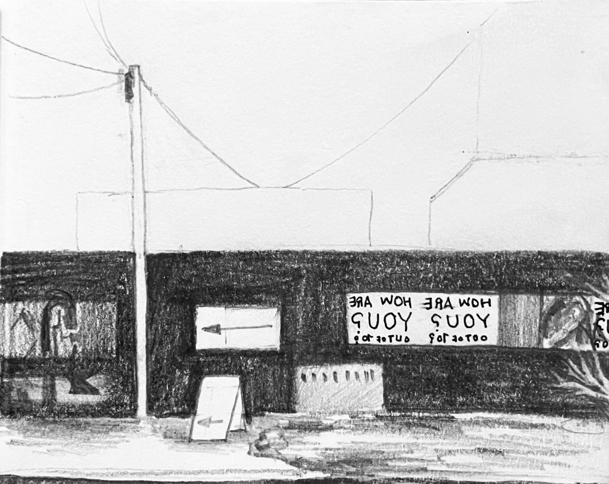 How are you graffiti sign backwards with an arrow pointing left