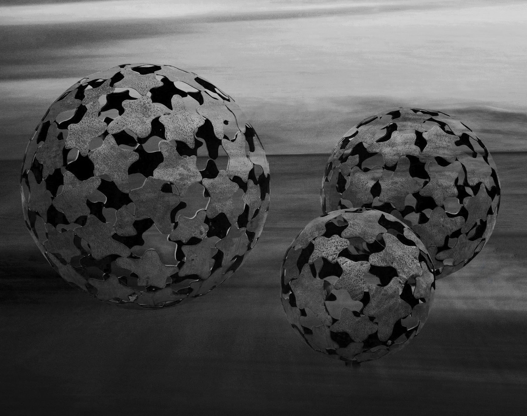 A composite of an infrared image of the sculpture and a seascape ICM, blended in Photoshop and converted to black and white