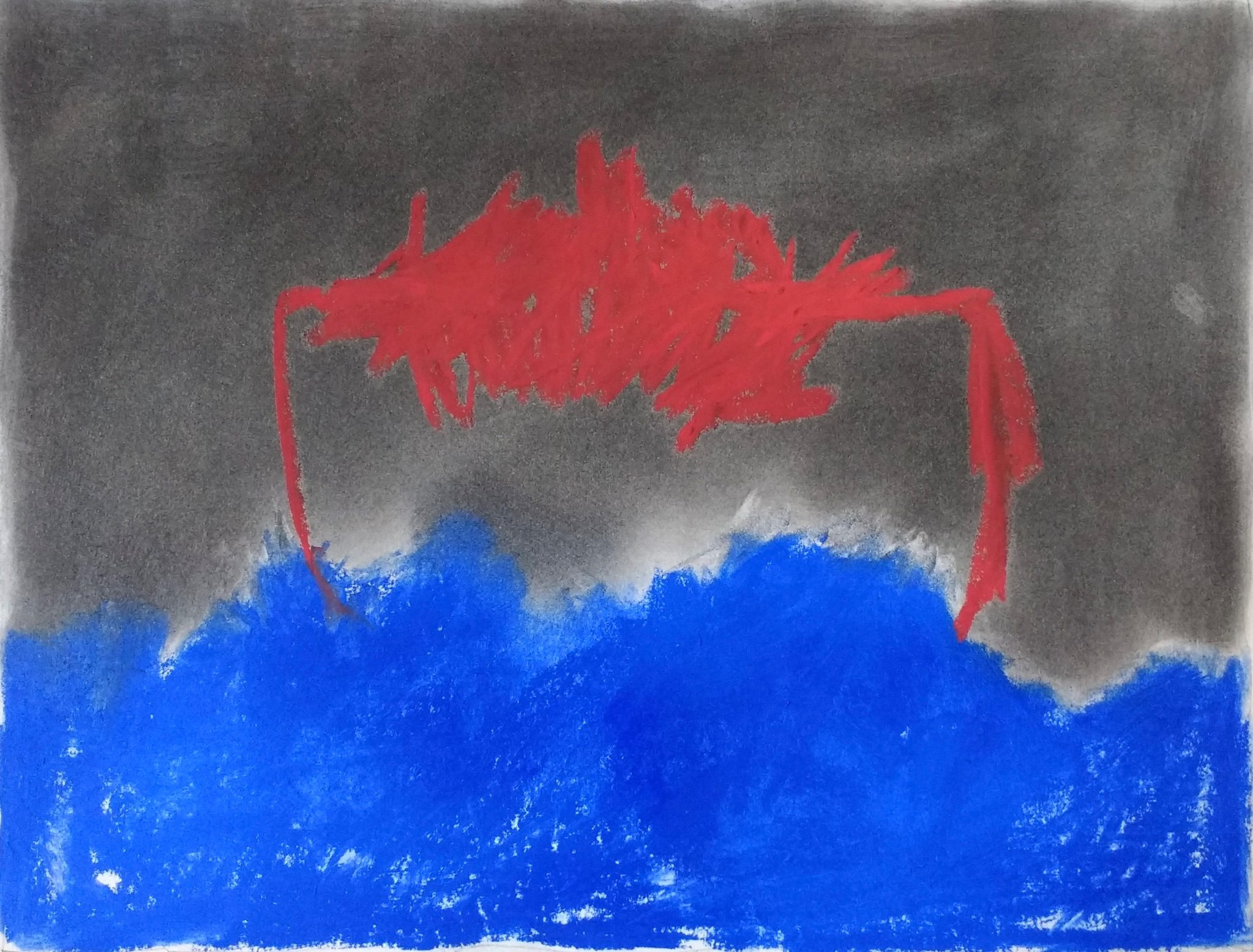 Rectangular dry media on paper. Upper half charcoal, lower half dark blue soft pastel. In red an arc drawn with jagged marks.