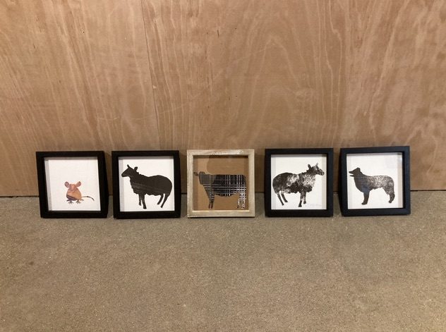 6 paper animal cut outs in black frames
