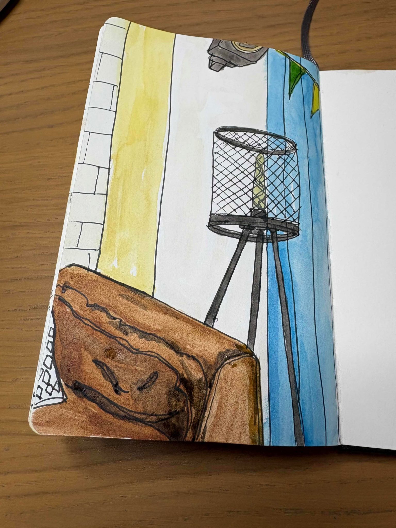 Watercolour of lamp, sofa, speaker and bunting