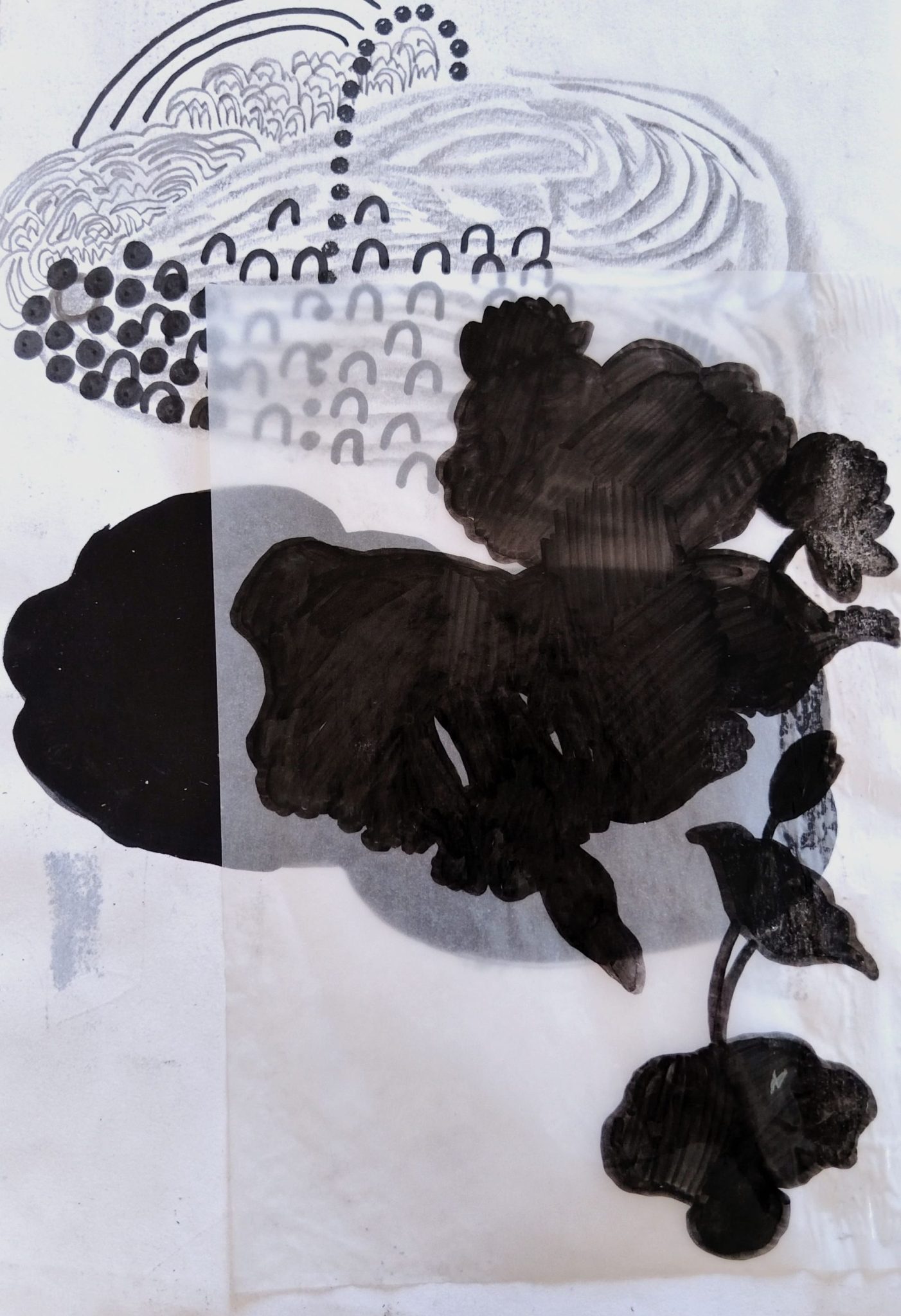 Abstract black forms painted onto butcher paper and layered together