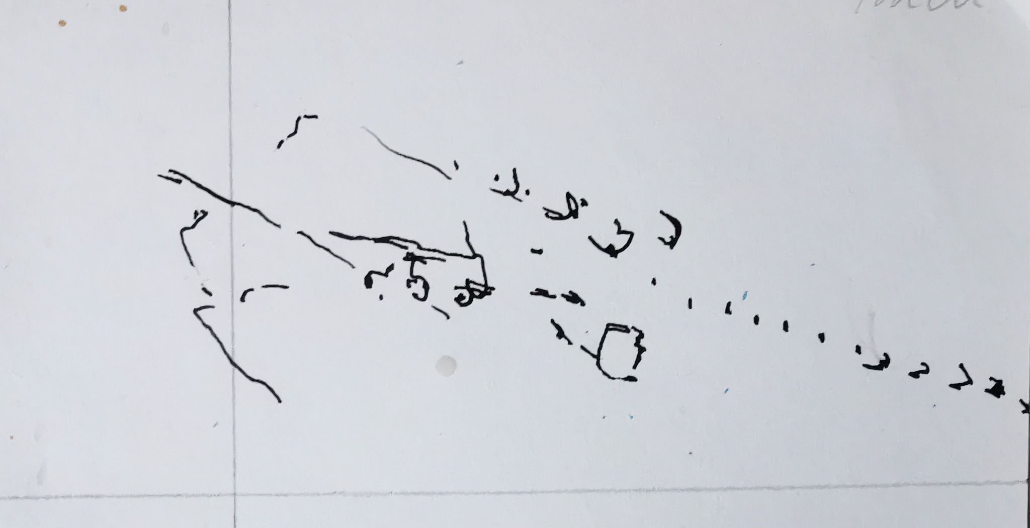 Short pen marks on paper