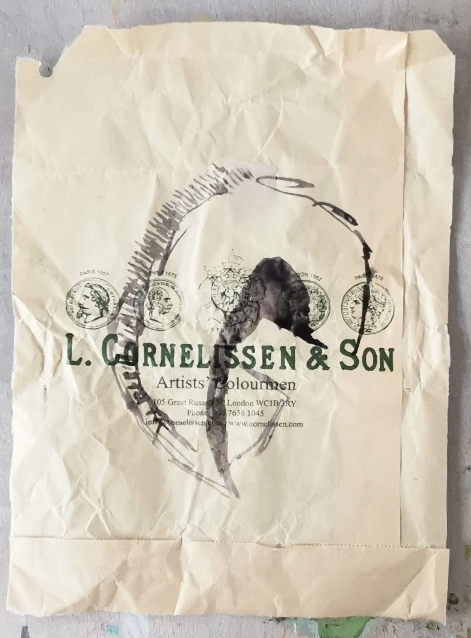 Ink drawing of a seed on a brown paper bag