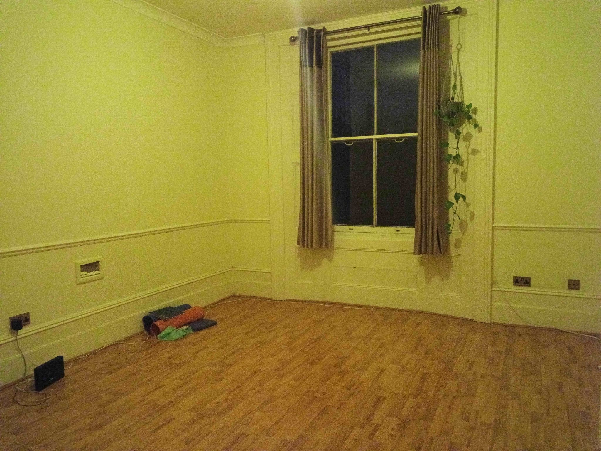 Cleared living room, no furniture at all