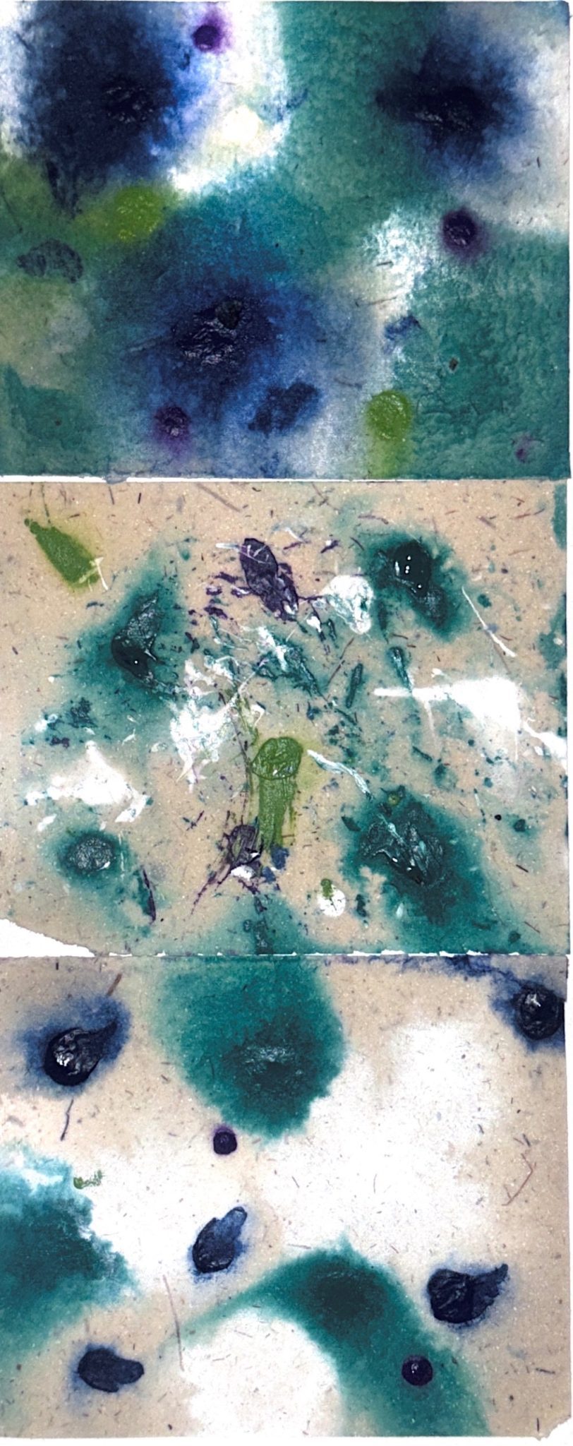 3 blue and green water colour squares on top of each other created by the rain