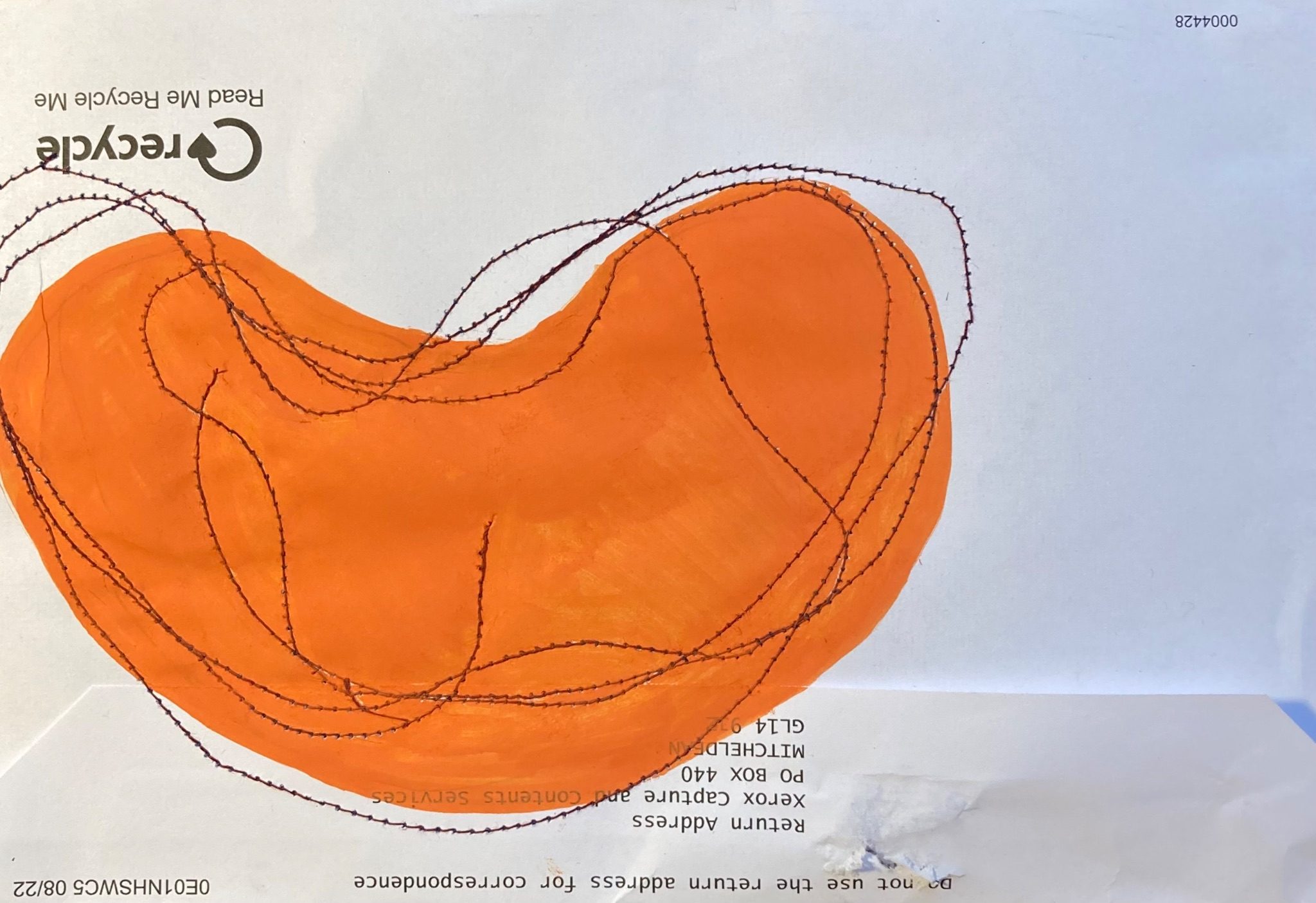 Kidney bean sewn and coloured backwards on the back of an envelope
