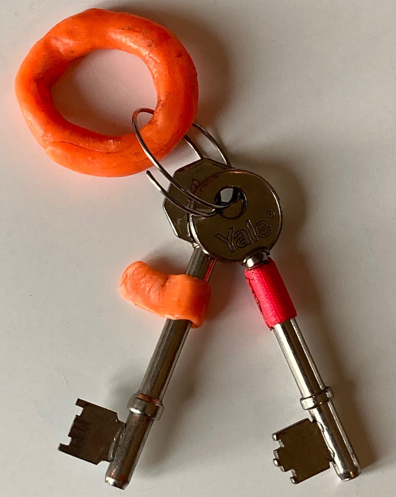 Mended key and new key ring (circular) using bright orange form card