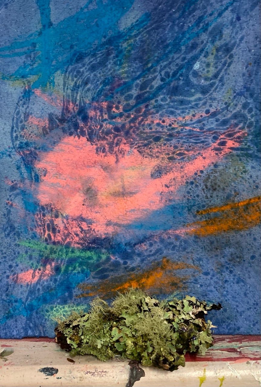 A little painting and beautiful lichen placed on altar, an offering for the birds