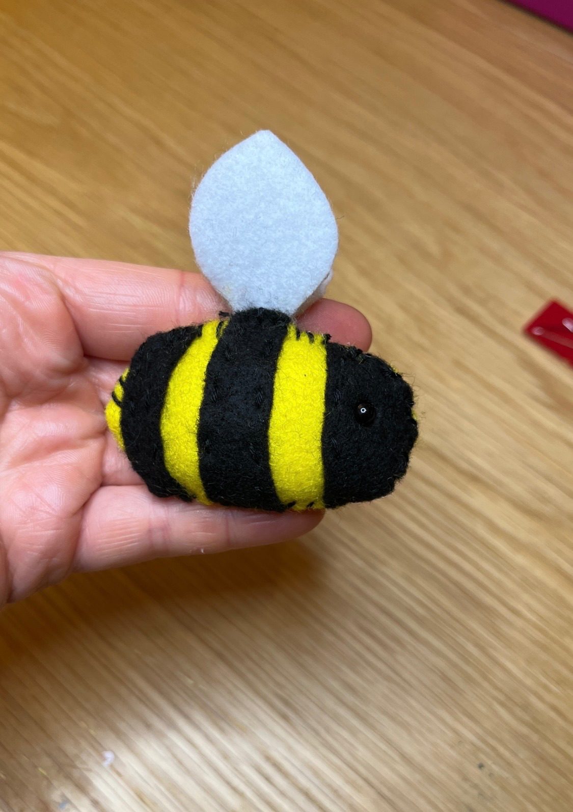 Felt bee with a little shiny eye