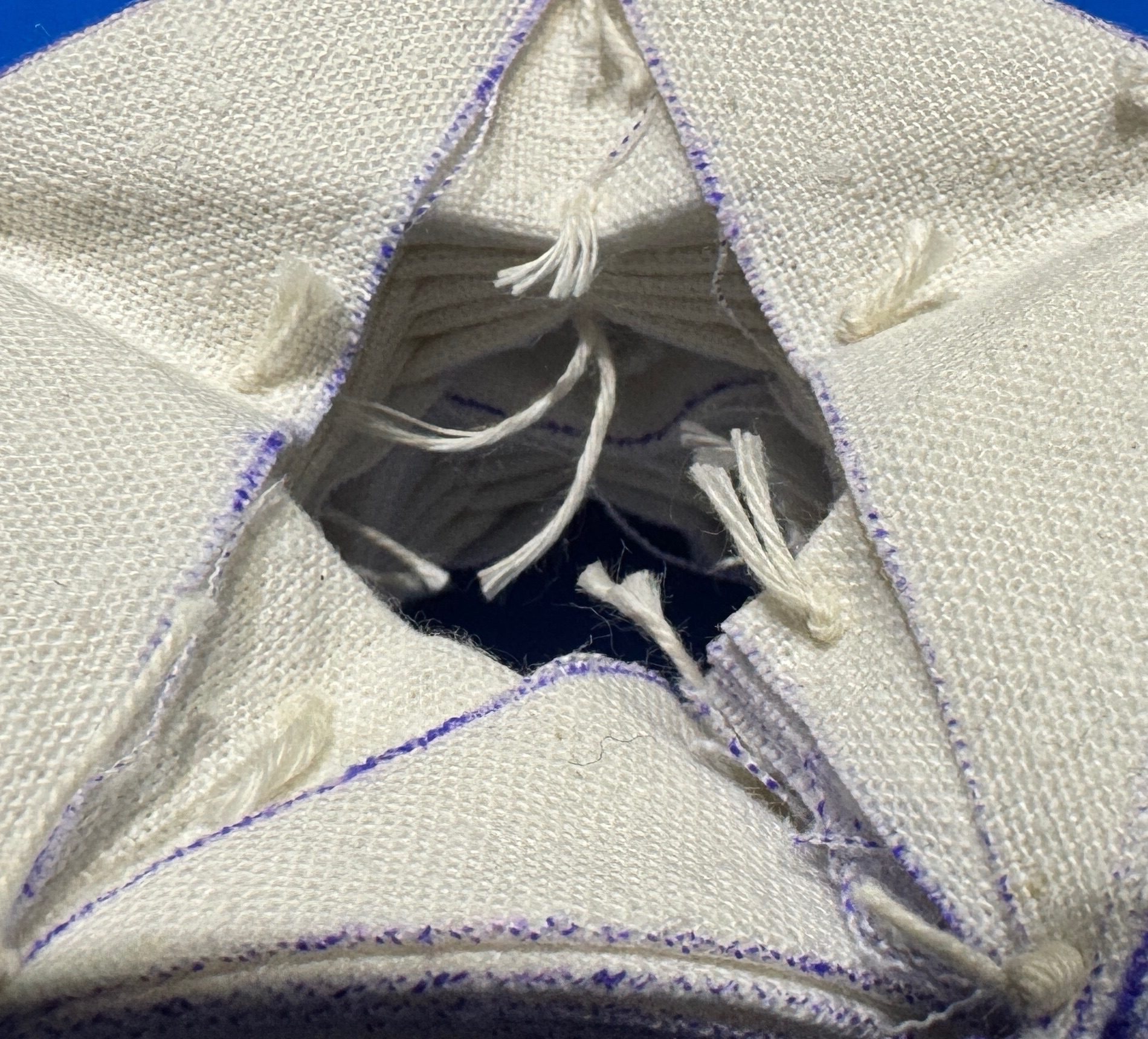 Origami folded fabric ready for the indigo vat!