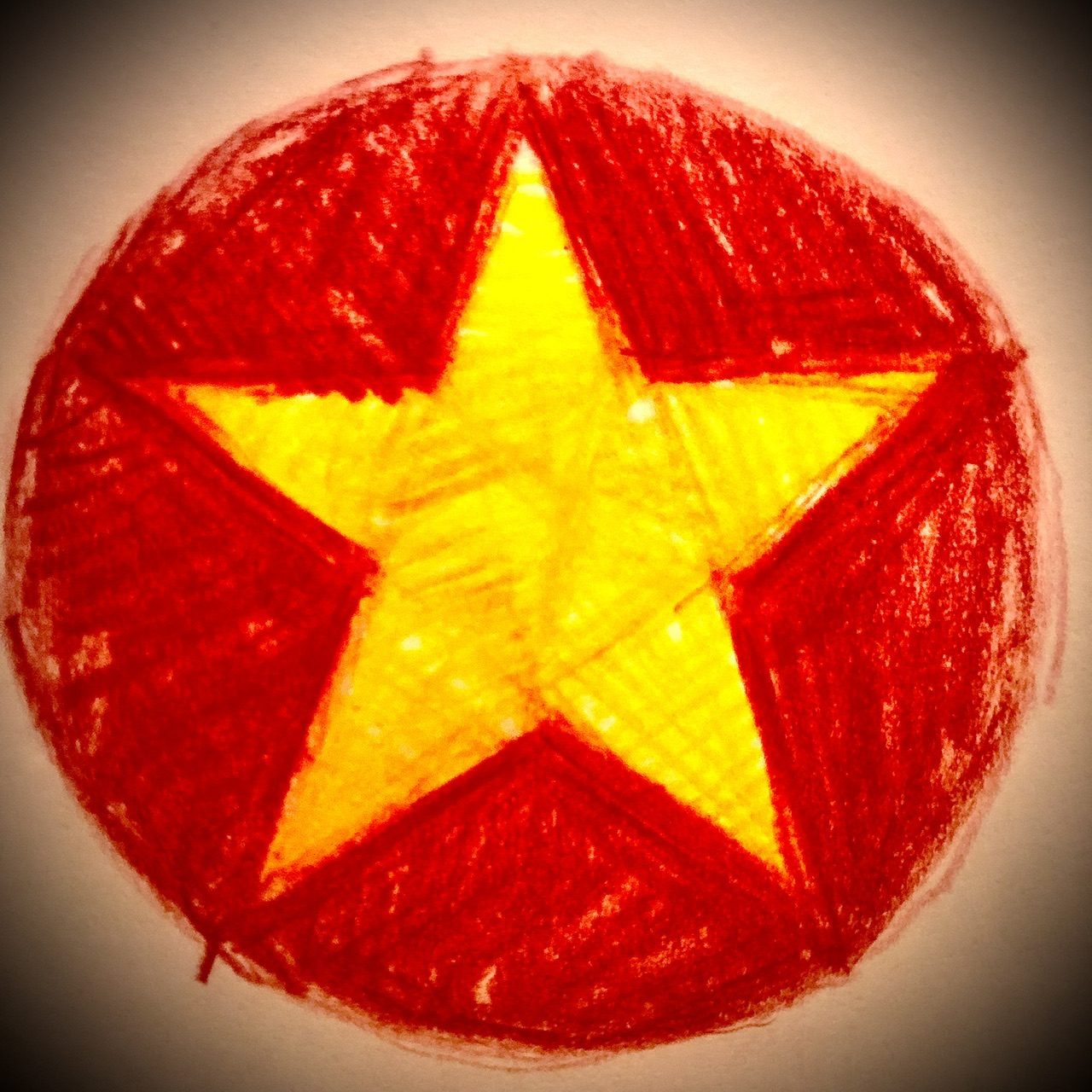 Coloured pencil sketch of yellow star on red ground