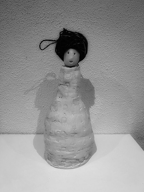 Ceramic vessel with hand dyed cotton