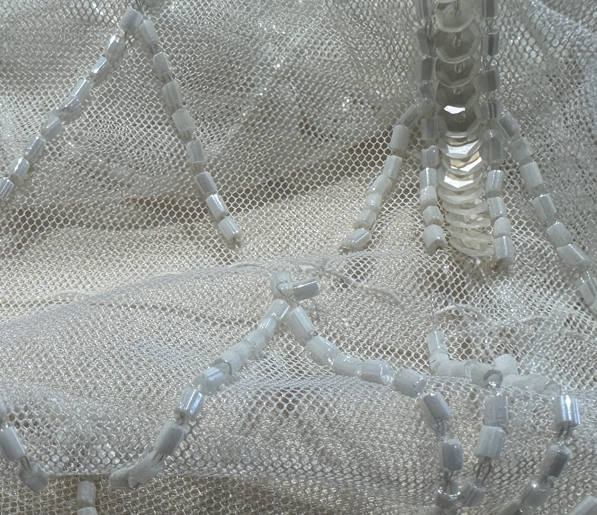 Shortening my future daughter-in-law’s beaded wedding dress!