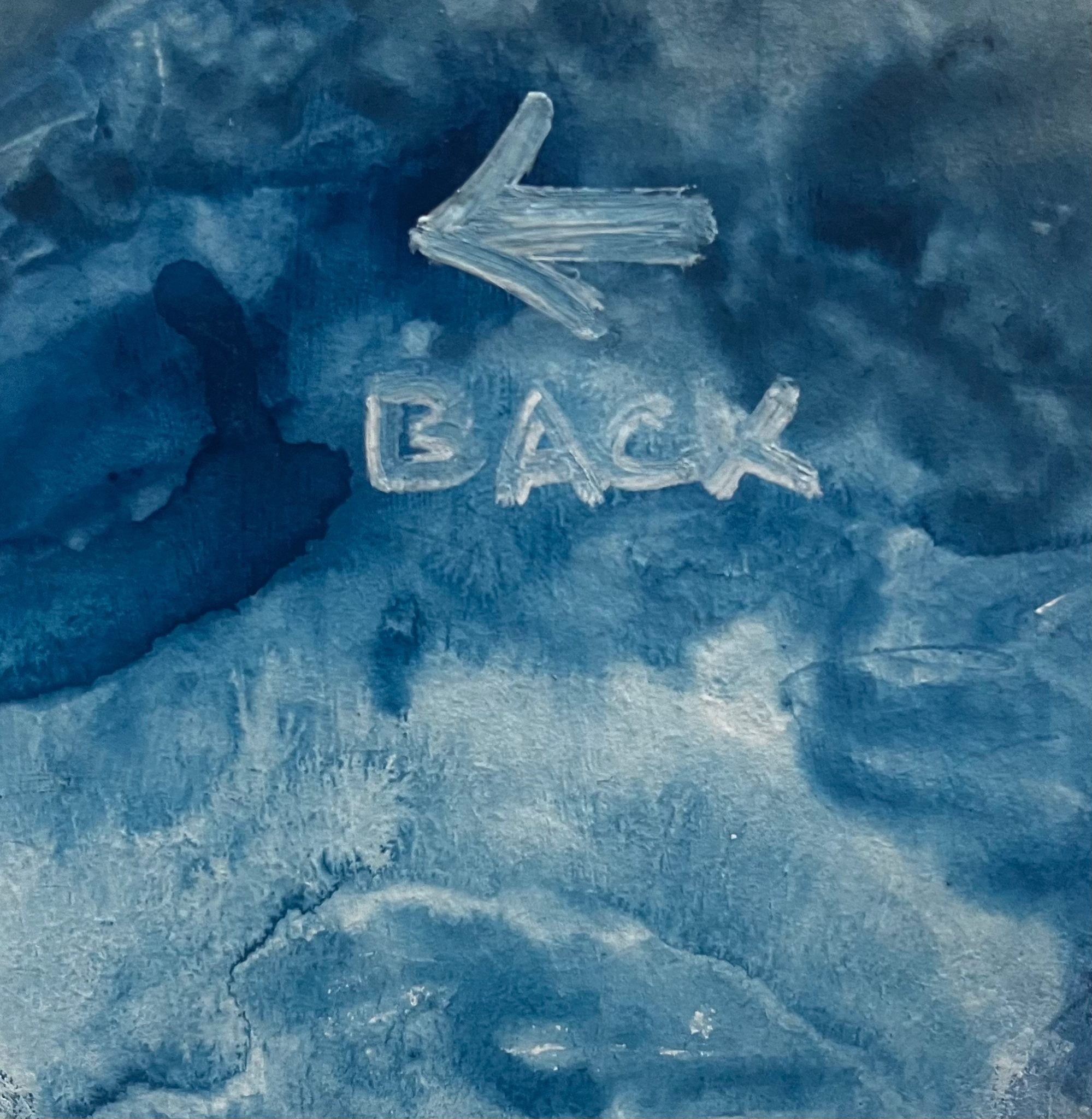 Back in letters and Pfeil on Blue pouring