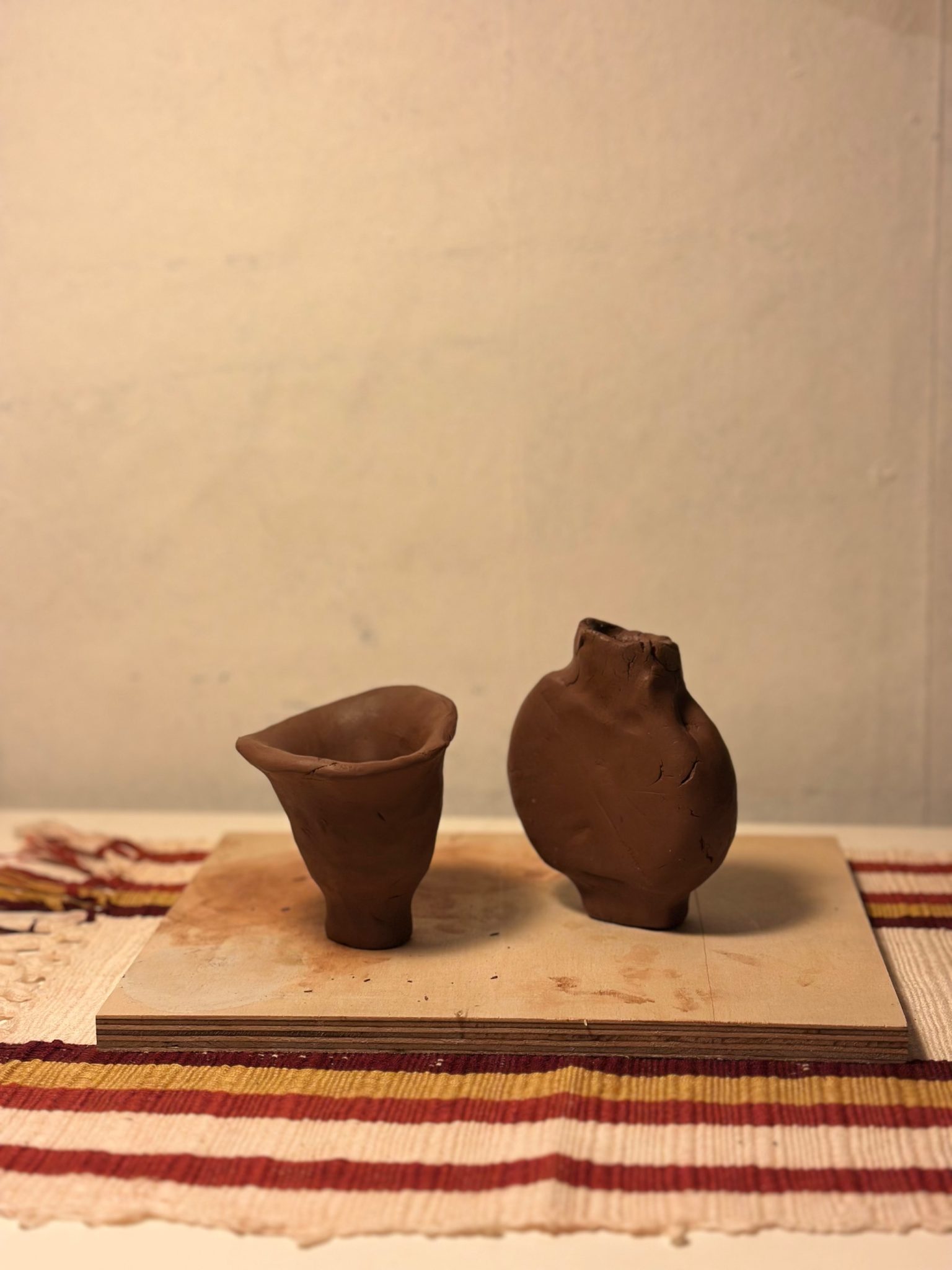 Two clay vessels made blindfolded